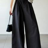 Pantaloni larghi a vita alta e rilassati in stile retrò