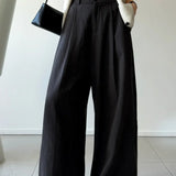 Pantaloni larghi a vita alta e rilassati in stile retrò