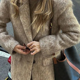 Soprabito retrò in lana con bottoni e risvolto