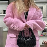 Soprabito retrò in lana con bottoni e risvolto