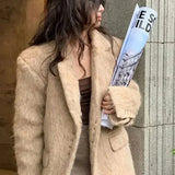 Soprabito retrò in lana con bottoni e risvolto