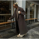 Cappotto doppiopetto in lana a coste