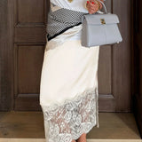 Gonna midi con spacchi laterali e pannelli in pizzo satinato