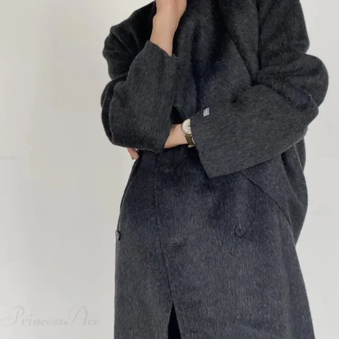 Cappotto doppiopetto in lana con collo a sciarpa