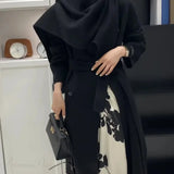 Cappotto doppiopetto in lana con collo a sciarpa