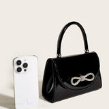 Borsa da sera con pochette in cristallo e paillettes