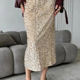 Gonna midi a vita alta con paillettes