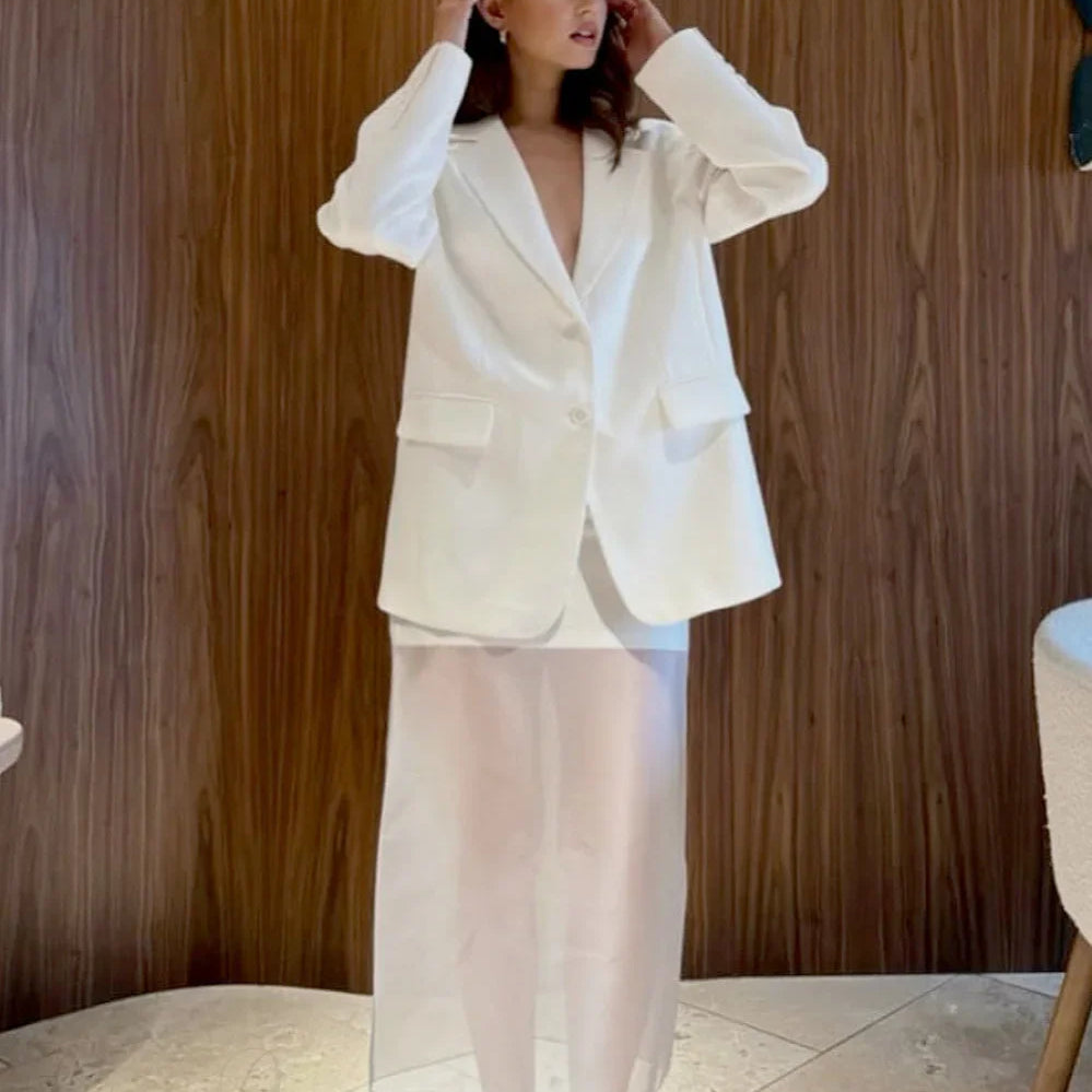 Gonna midi trasparente a vita alta