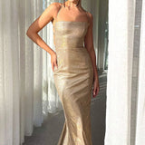 Abito da festa con cintura e schiena scoperta e luccicante