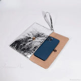 Pochette da sera con paillettes e strass argentati