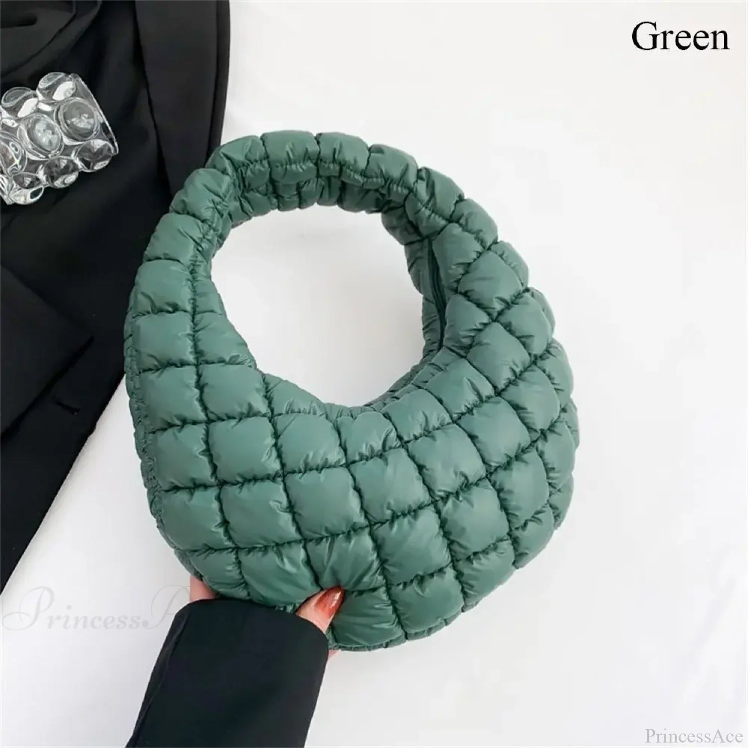 Piccola borsa a mano imbottita in cotone trapuntato