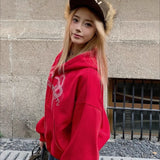 Felpa con cappuccio corta con zip e strass stampa serpente