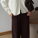 Cardigan corto in maglia con cappuccio e doppia cerniera morbida