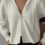Cardigan corto in maglia con cappuccio e doppia cerniera morbida
