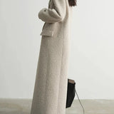 Soprabito a maniche lunghe in patchwork tinta unita