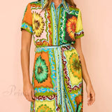 Abito midi con stampa speciale di girasoli ed eleganza