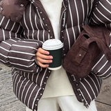 Cappotto trapuntato caldo con cappuccio a righe e collo alto