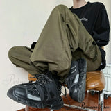 Pantaloni dritti alla moda, tasche larghe sulle gambe, pantaloni da jogging