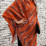 Cappotto rilassato in maglia a righe con cappuccio e nappe