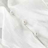 Camicetta in Tencel con scollo a V e maniche svasate e volant