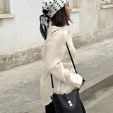 Camicetta asimmetrica a maniche lunghe in Tencel trasparente