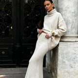 Completo due pezzi con abito lungo in maglia a collo alto