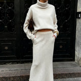 Completo due pezzi con abito lungo in maglia a collo alto