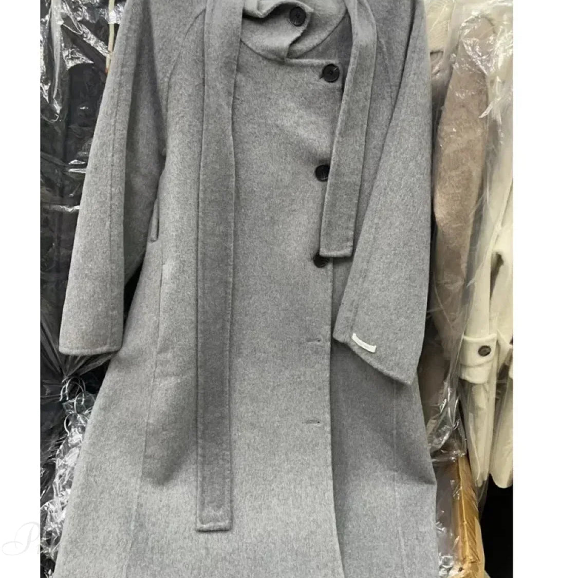 Cappotto monopetto in lana a collo alto