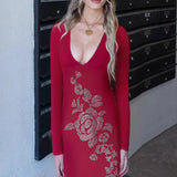 Abito lungo aderente con scollo a V e strass