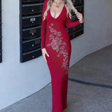 Abito lungo aderente con scollo a V e strass