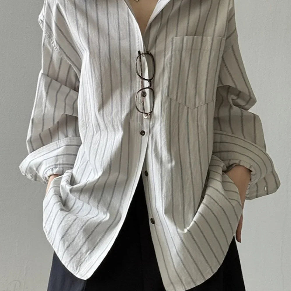 Blusa ampia in cotone a maniche lunghe a righe verticali