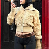 Cappotto monopetto vintage con risvolto ampio e vita stretta