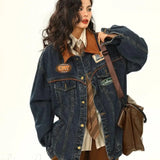 Giacca utility vintage in denim ricamato con revers larghi