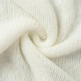 Completo due pezzi composto da cardigan in maglia vintage e abito senza maniche