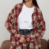 Camicetta vintage a quadri con colletto e maniche lunghe e tasche