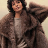 Cappotto minimalista in pelliccia sintetica vintage tinta unita