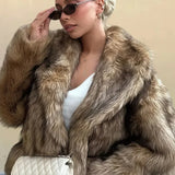 Cappotto minimalista in pelliccia sintetica vintage tinta unita