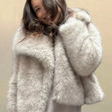 Cappotto minimalista in pelliccia sintetica vintage tinta unita