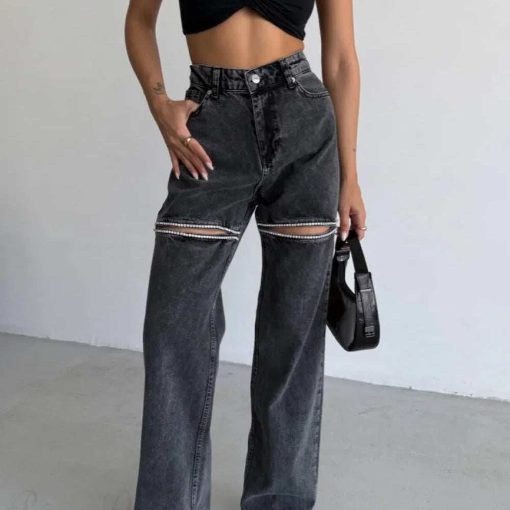 Jeans dritti con effetto consumato e catena lavata