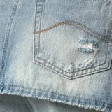 Jeans larghi irregolari a vita alta in denim lavato