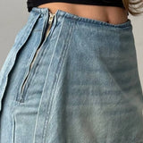 Jeans larghi irregolari a vita alta in denim lavato