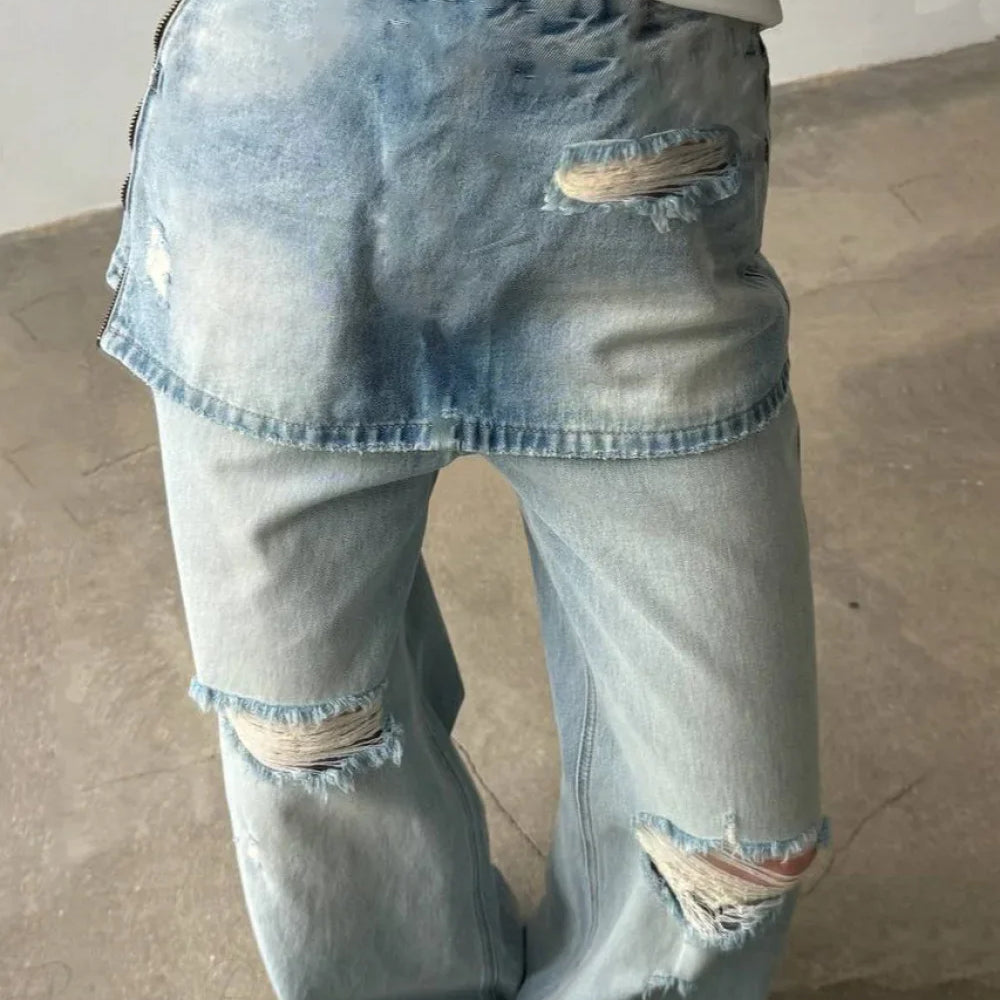 Jeans larghi irregolari a vita alta in denim lavato