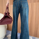 Jeans larghi svasati a vita alta e snellenti