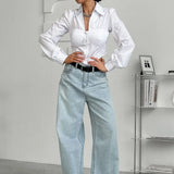 Camicetta bianca in cotone con colletto e maniche a sbuffo