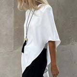 Camicetta bianca a maniche corte con scollo tondo irregolare