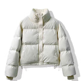 Piumino corto da donna, cerniera frontale e bottoni automatici, collo alto