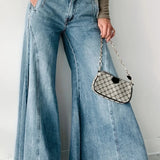 Jeans eleganti e semplici in denim lavato a gamba larga