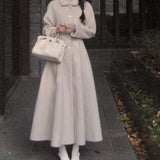 Cappotto con gonna di lusso in misto lana