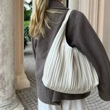 Cappotto doppiopetto in lana con colletto a maniche corte