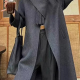 Soprabito di lana con un bottone e maniche lunghe